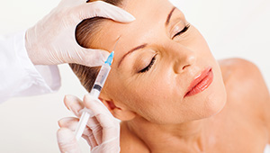 Woman recieving Botox injections