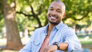 smiling man who has benefitted from cold laser therapy in Richardson 