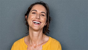 woman smiling yellow