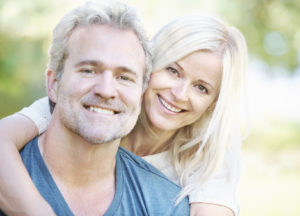 smiling middle aged couple