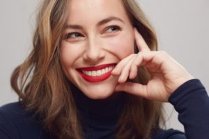 person smiling after getting Botox for facial scars