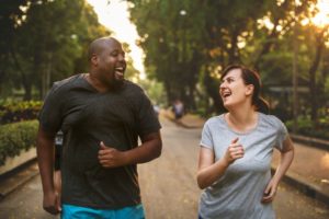 two people walking to exercise for weight loss